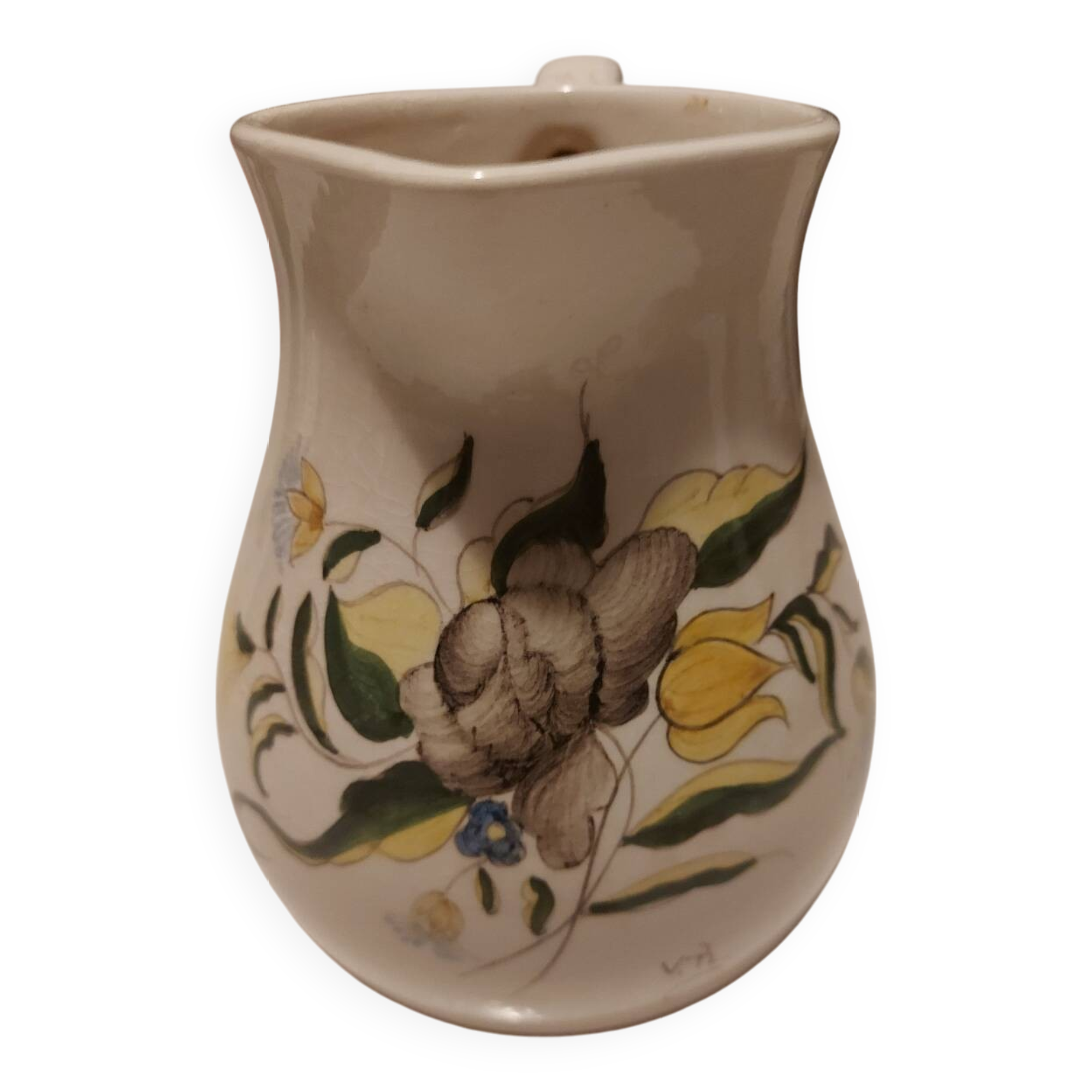 Earthenware pitcher with floral motifs in the Moustiers style, signed.