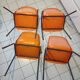 Chairs orange plastic shells seats and backrests imitation leather