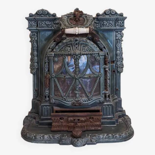 Mobile cast iron stove model "la chatte" designed by the French engineer Edmond Chaboche in 1883.