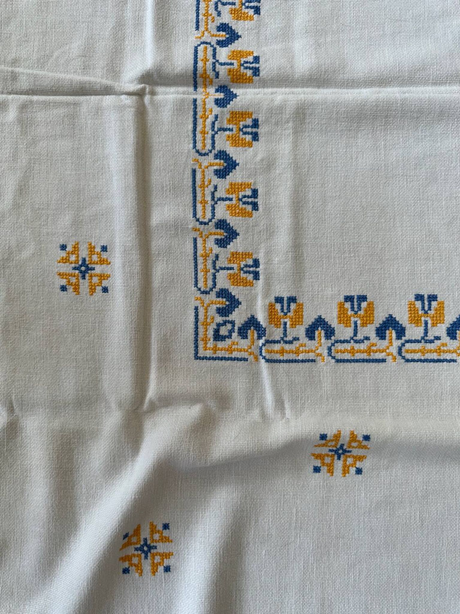 Embroidered white tablecloth