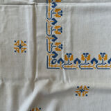 Embroidered white tablecloth