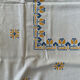 Embroidered white tablecloth