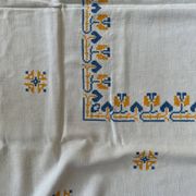 Embroidered white tablecloth