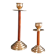 Two vintage wooden and brass candlesticks.