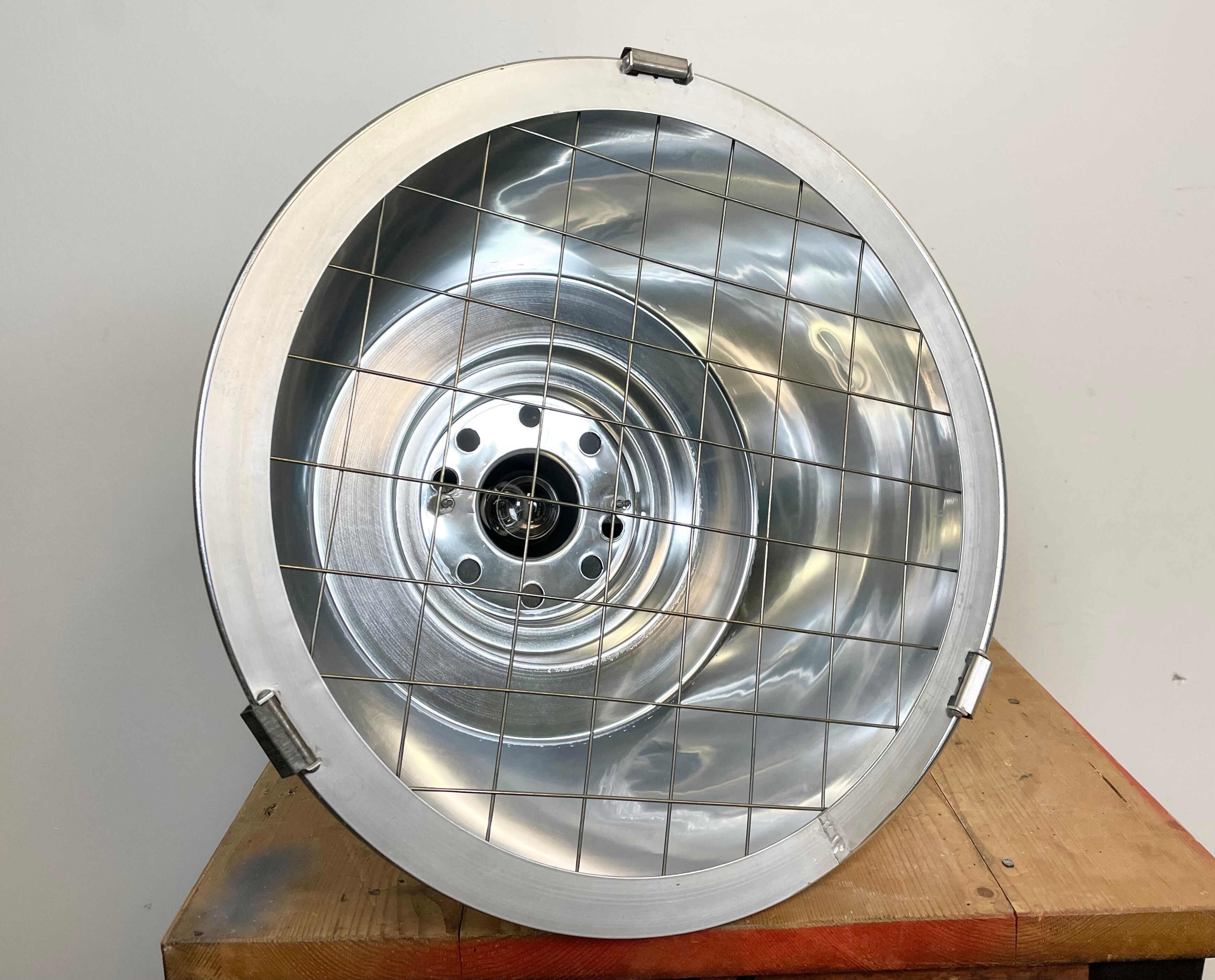 Industrial aluminium lamp with iron grid from siemens, 1980’s