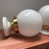 Set of two white opaline ball wall lights