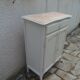 Small vintage buffet reimagined in pearl grey, wooden top.