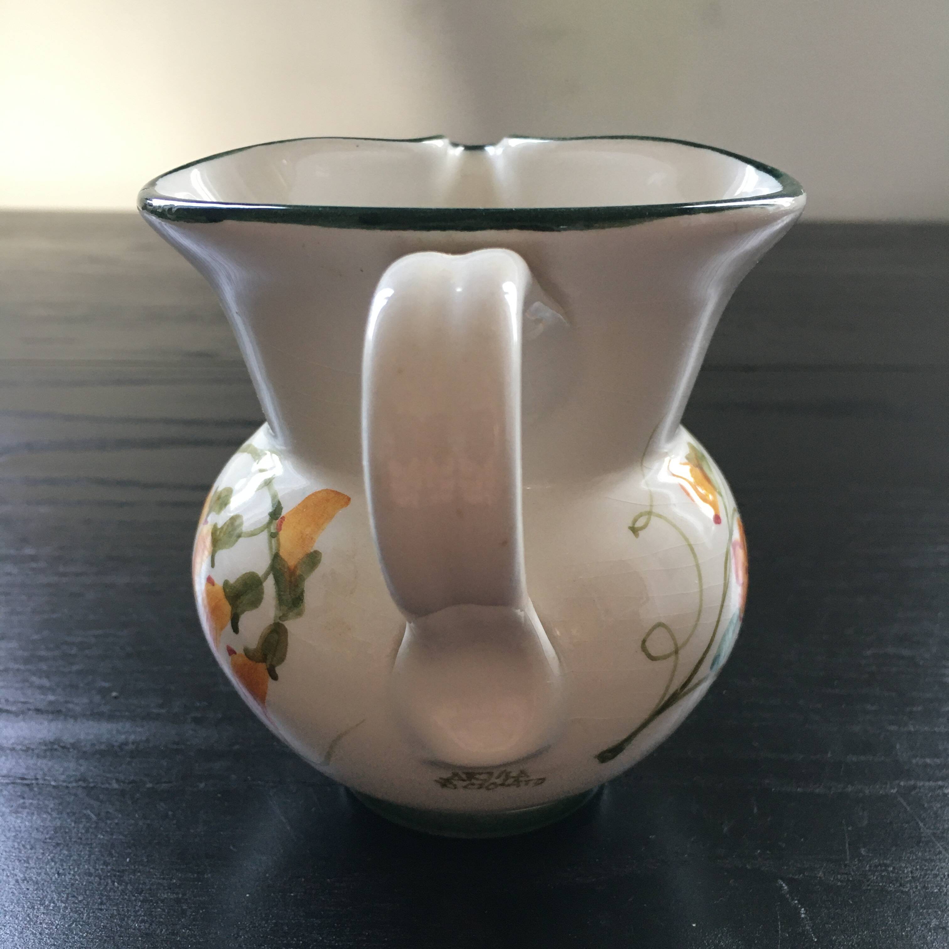 Small pitcher with floral decoration