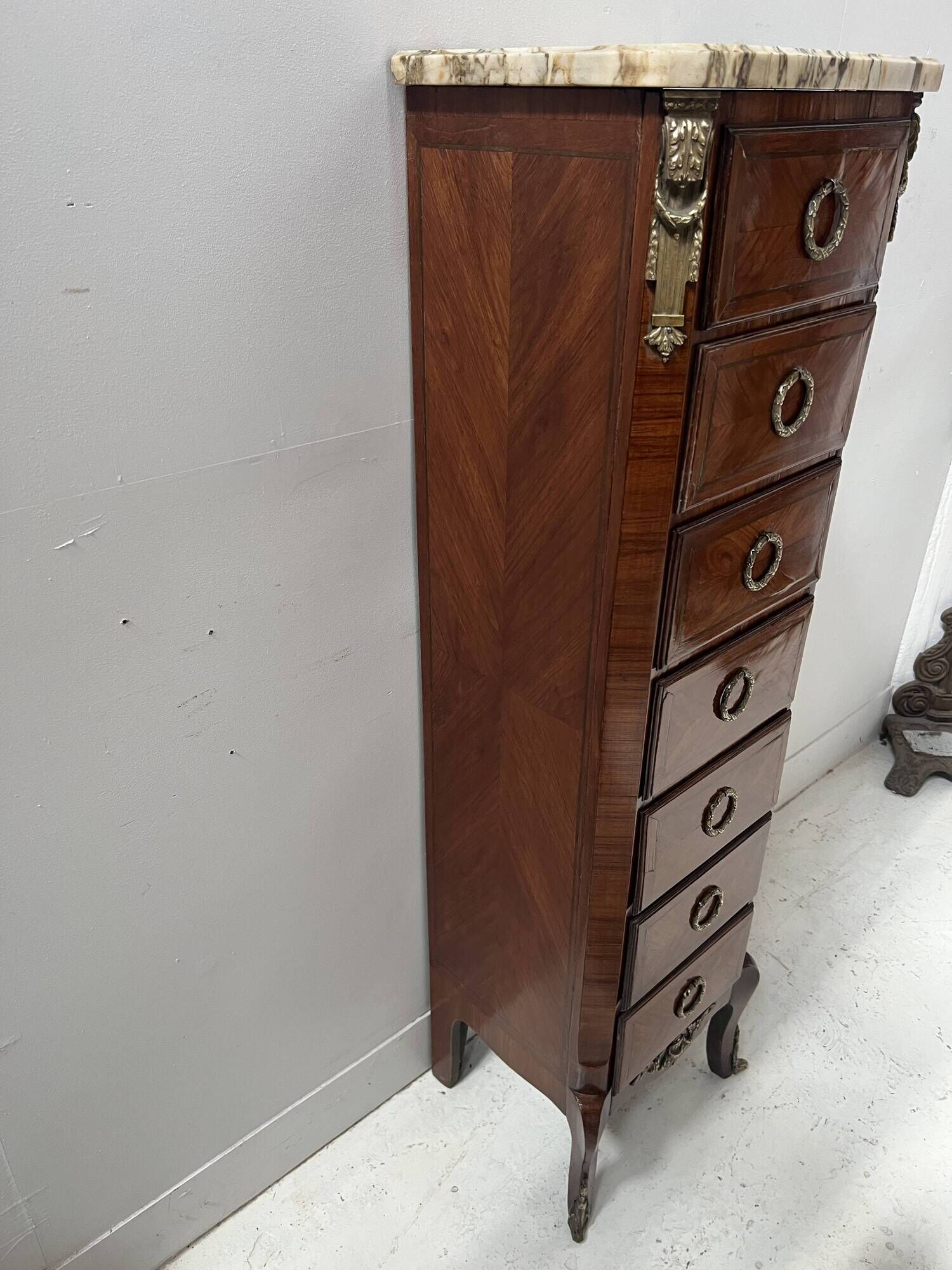 Semainier de style Transition en placage de bois, XXème siècle