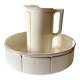 Washbasin and toilet jug in Sarreguemines earthenware.