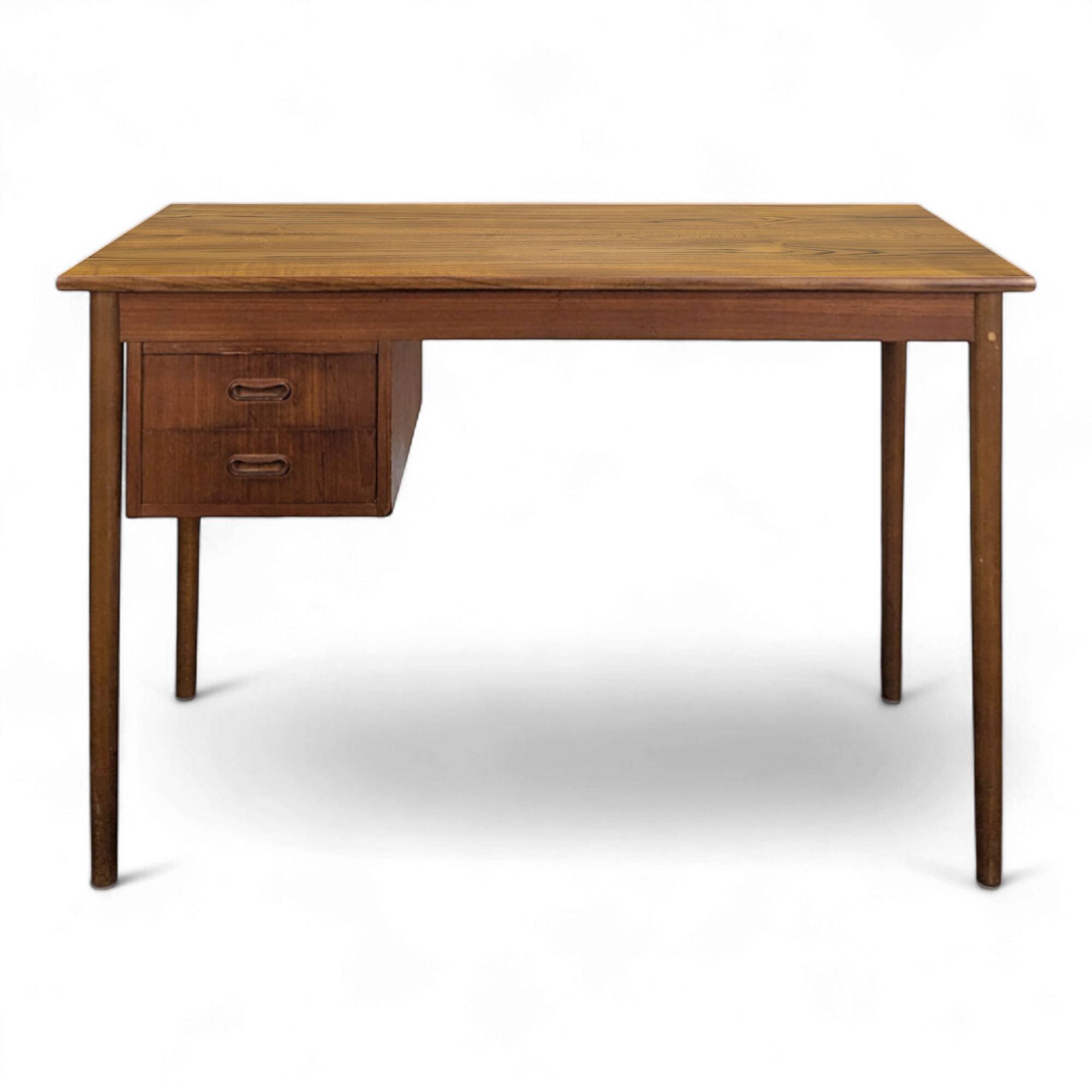 Scandinavian teak desk with a suspended drawer unit.