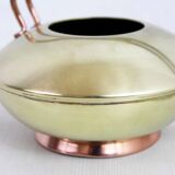 Watering can in brass and copper