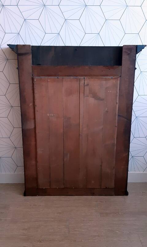 Henri II trumeau mirror for a fireplace in solid walnut.