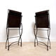 Ensemble de 2 chaises pliantes anciennes en fer forgé et cuir