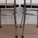 Pair of chrome and cane bistro chairs from the 70s.