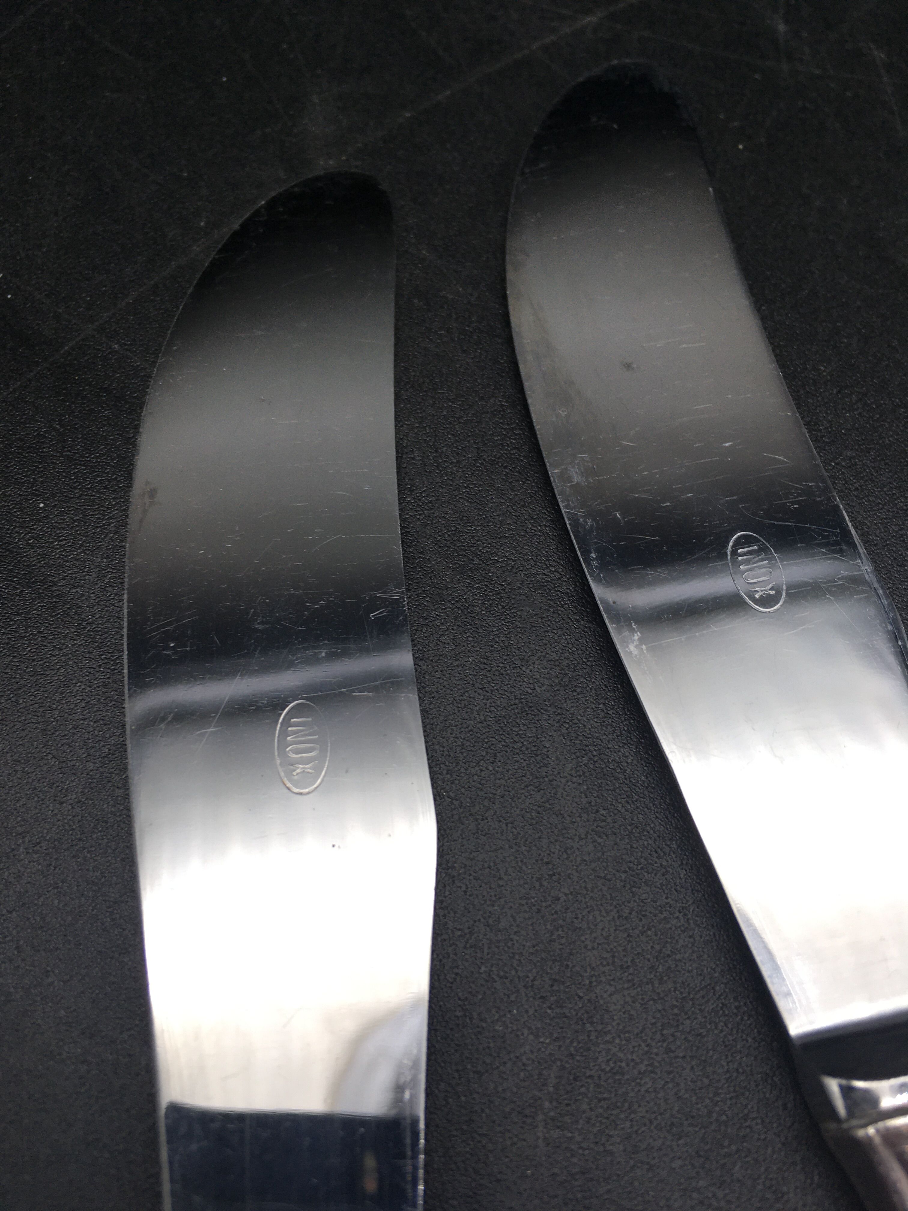 12 silver metal knives