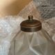 Pair of Art Deco pressed glass vases converted into lamps signed Carrillo.