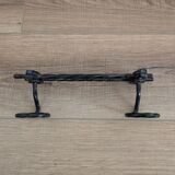 Wrought iron wall coat rack