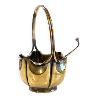 Old silver metal sugar bowl and golden patina