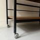 Rolling serving table in wood and black metal by Pierre Guariche for Meurop, design 1960