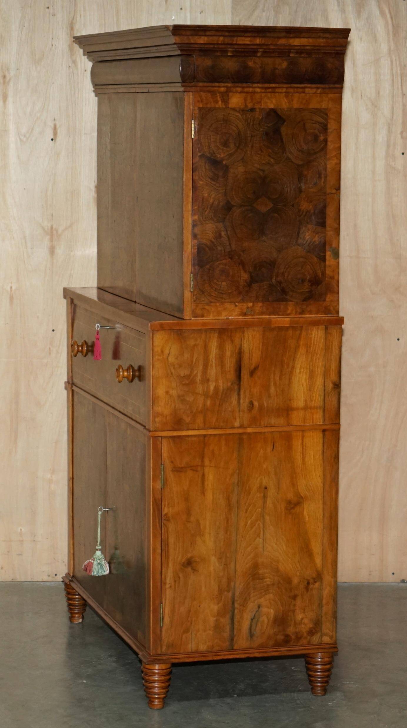 Queen Anne style pedestal commode from around 1710 in walnut and oyster veneer.