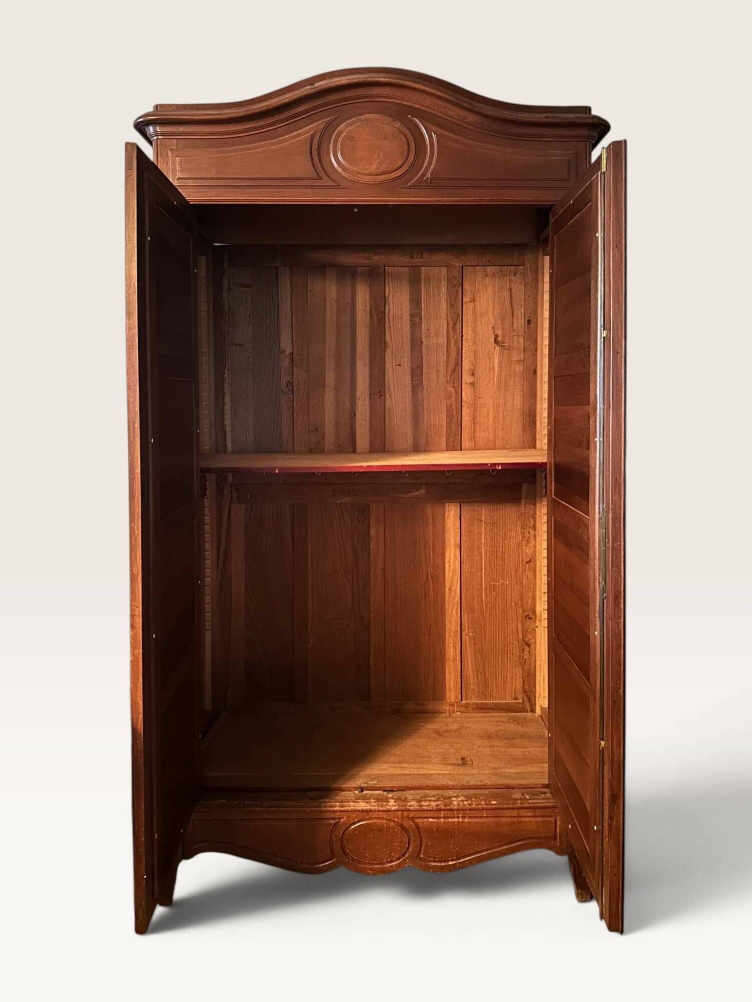 Louis XV style armoire with two bevelled mirror doors.