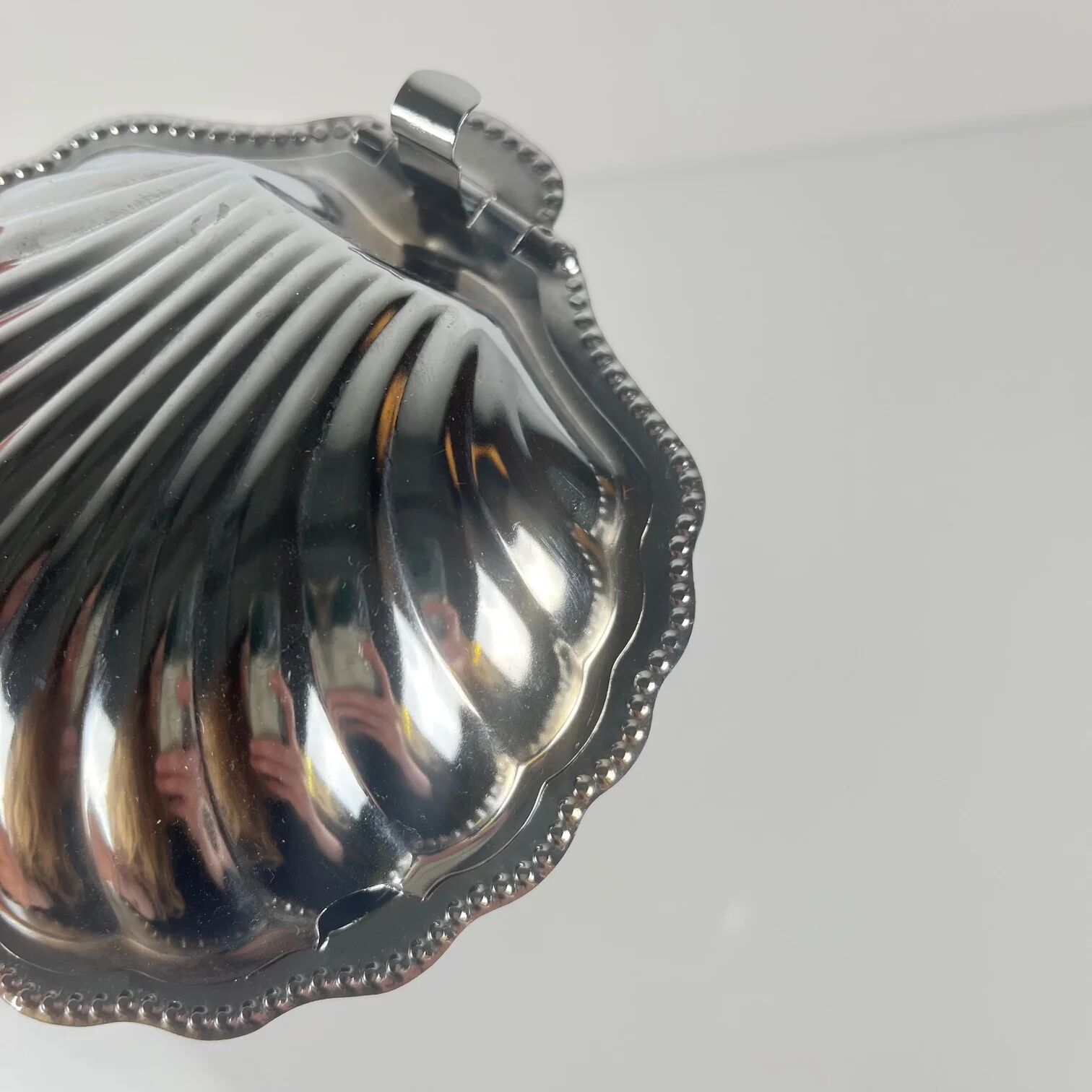 Metal shell butter dish with blue insert, 1970 with knife.