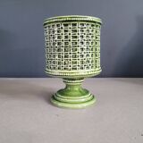 Green glazed ceramic flowerpot on stand