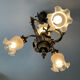Ancien lustre cage en bronze et 4 feux tulipe