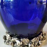 Corolle shaped vase in blown Art glass/Arte Murano Kristall Mery. Cobalt blue on a silver metal-look floral base. Dim 26 x 14 cm