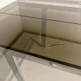 Smoked glass dining table with chrome legs, 1970s design by Roche Bobois.