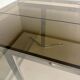 Smoked glass dining table with chrome legs, 1970s design by Roche Bobois.