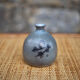 Glazed terracotta ball vase