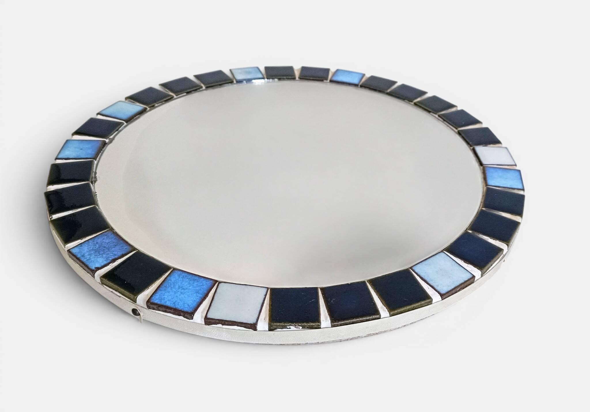 Round mosaic mirror in the style of Vallauris, France circa 1970.