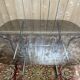 Tubular chrome and smoked glass dining table, 1970