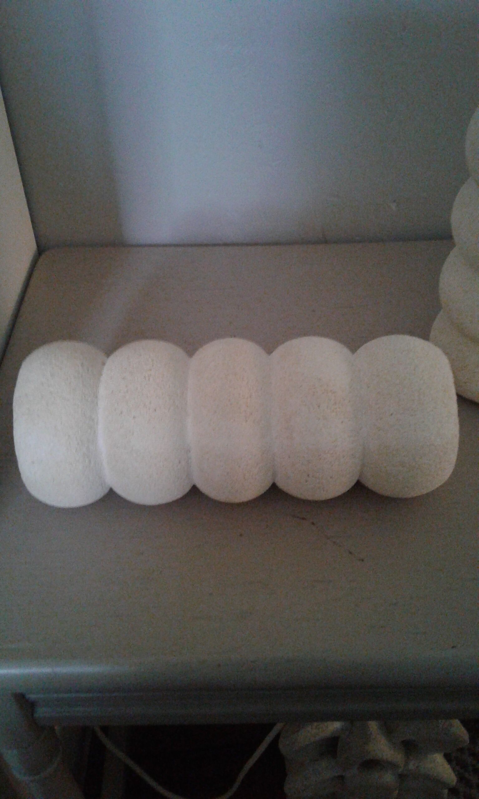 Pair of stone candlesticks