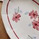 Ravier vintage ivory faience with floral rose decoration.