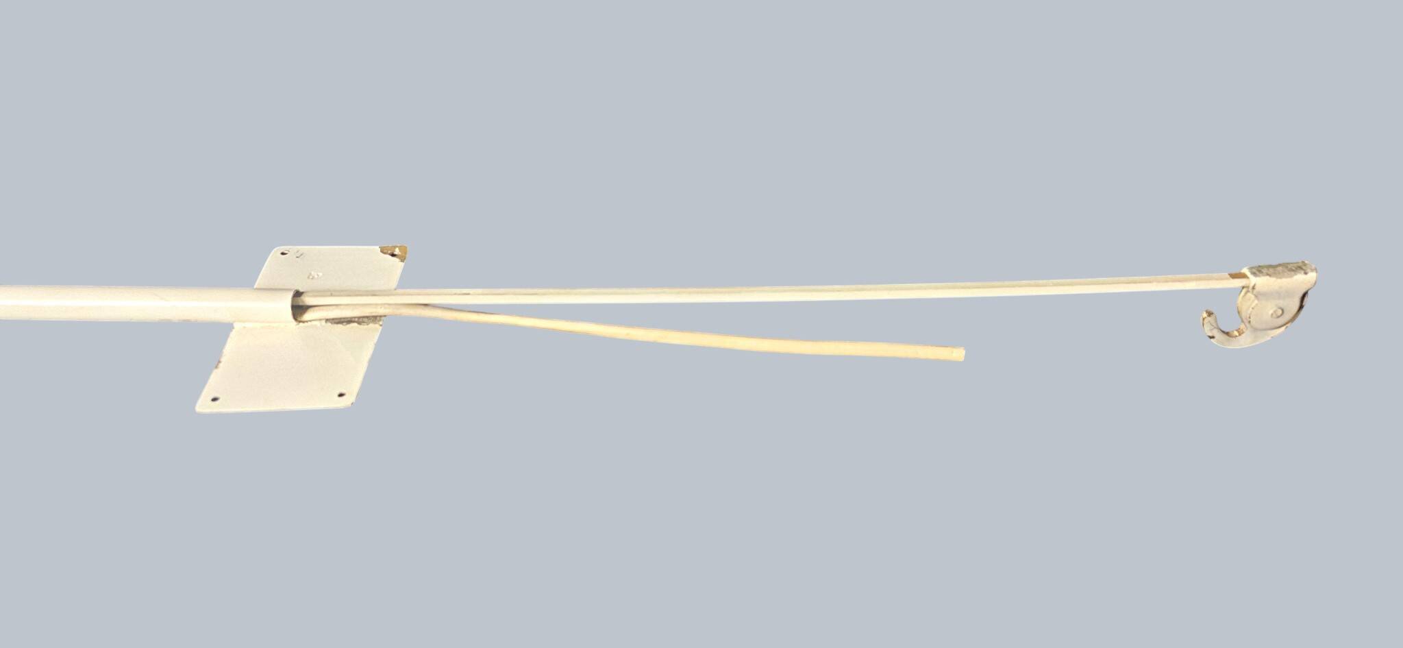 Minimalist metal wall light in the style of Jean Prouvé, circa 1950.