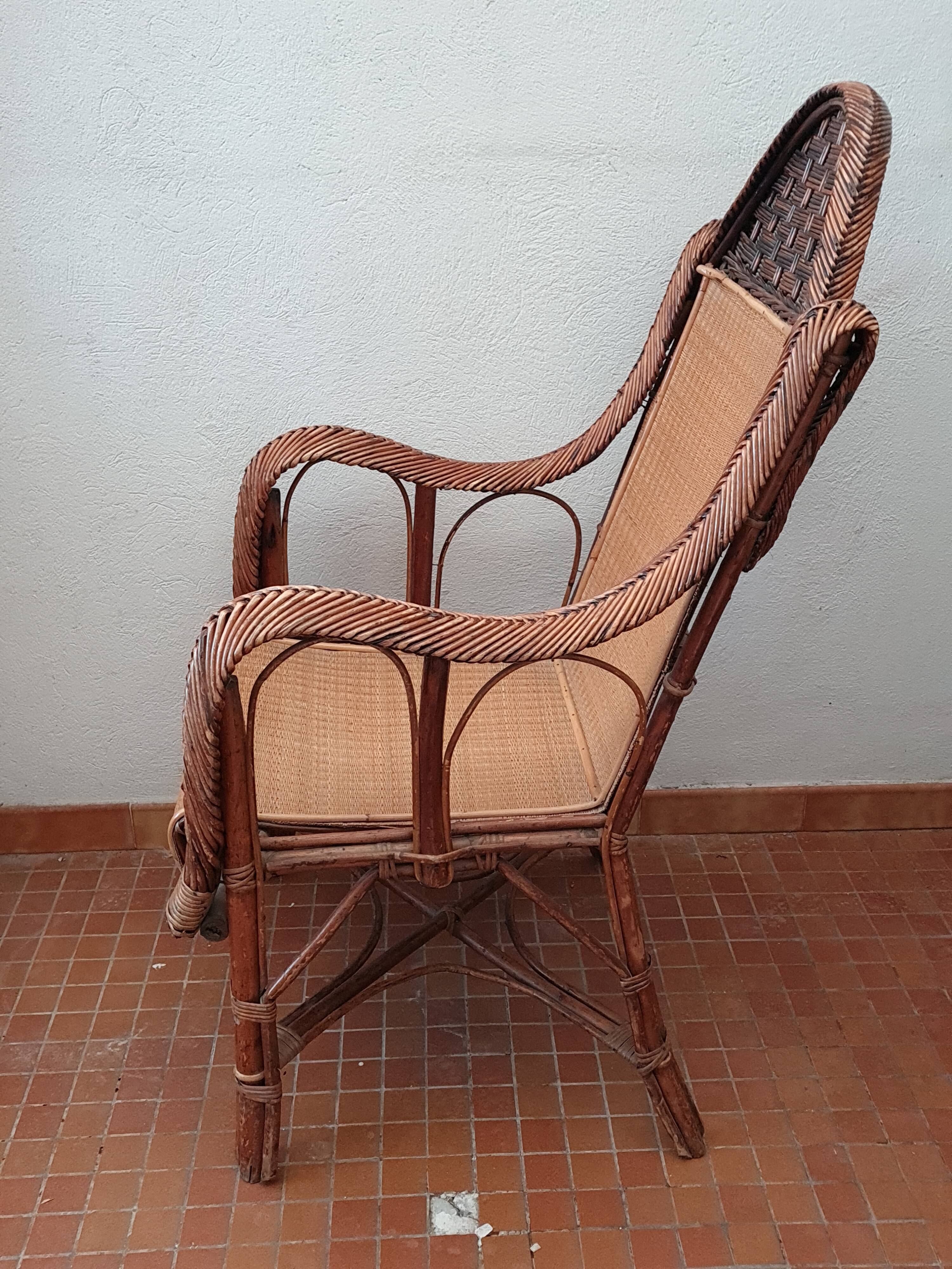 Old rattan armchair circa 1900-1930