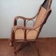 Old rattan armchair circa 1900-1930