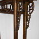 Wardrobe with Asian coat made of wood carved with dragons