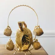 Service à liqueur en barbotine noix par la maison Louis Roque