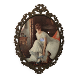 Italian oval frame in bronze and curved glass