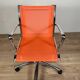 Designer office chair - Orange mesh and chrome base