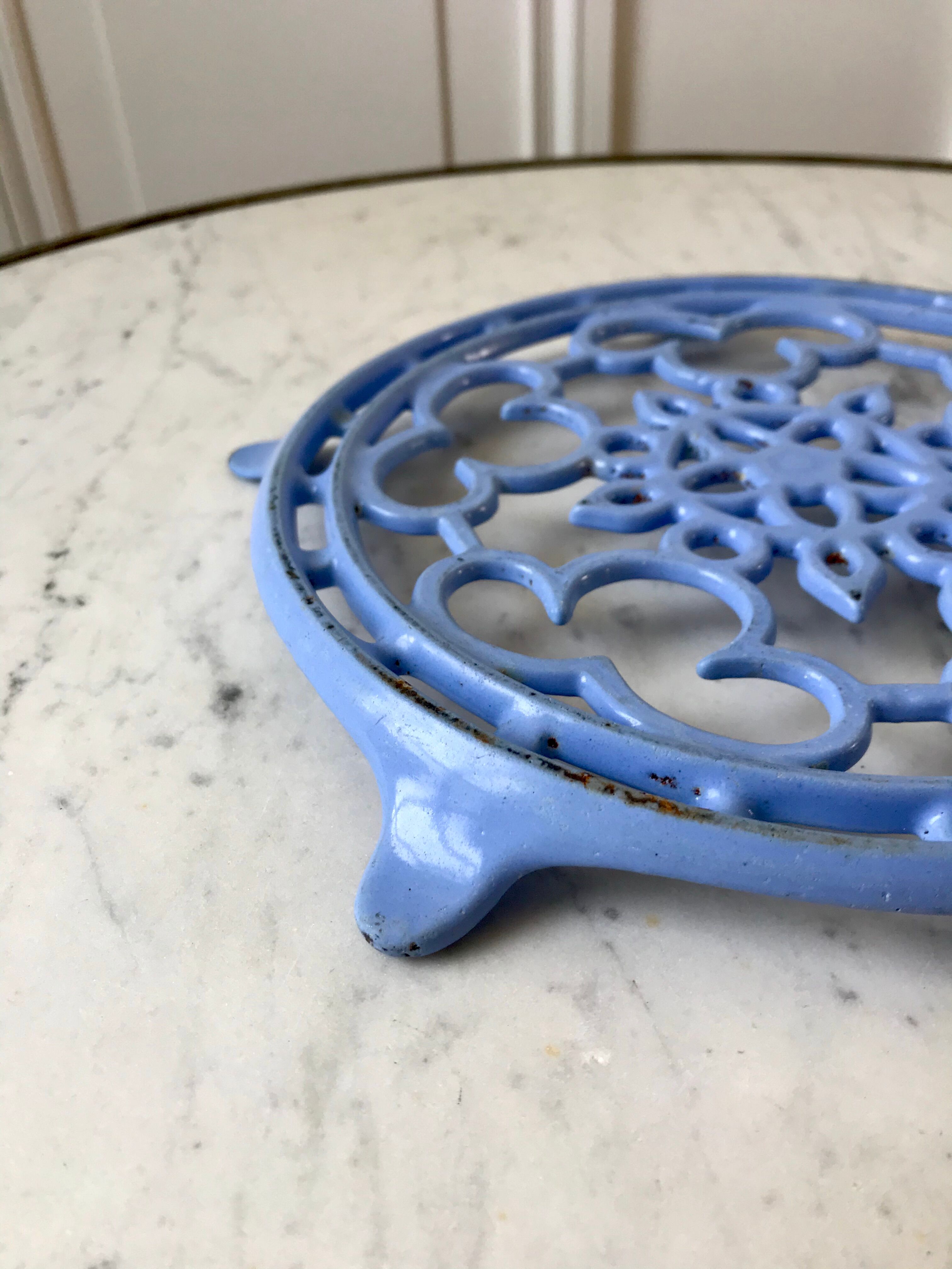 Cast iron coaster painted sky blue early twentieth century