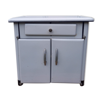 White enamelled sheet metal furniture