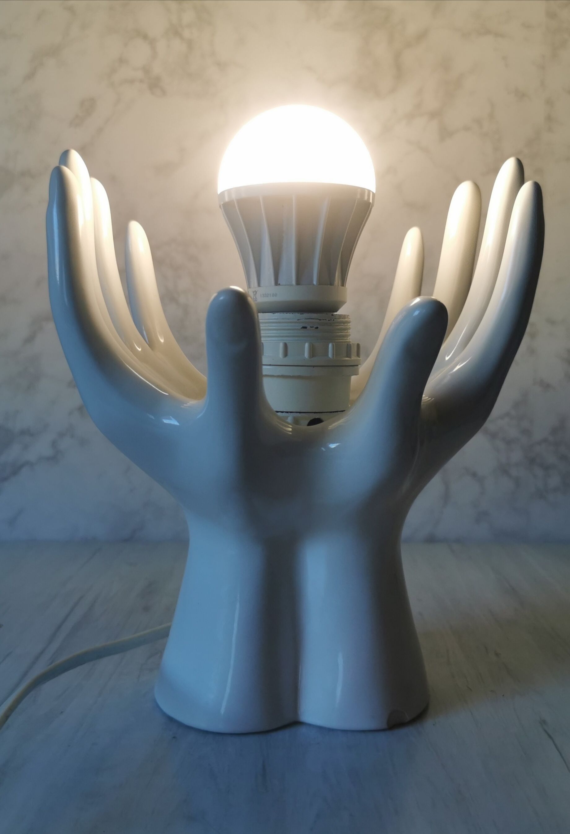 White ceramic hand lamp