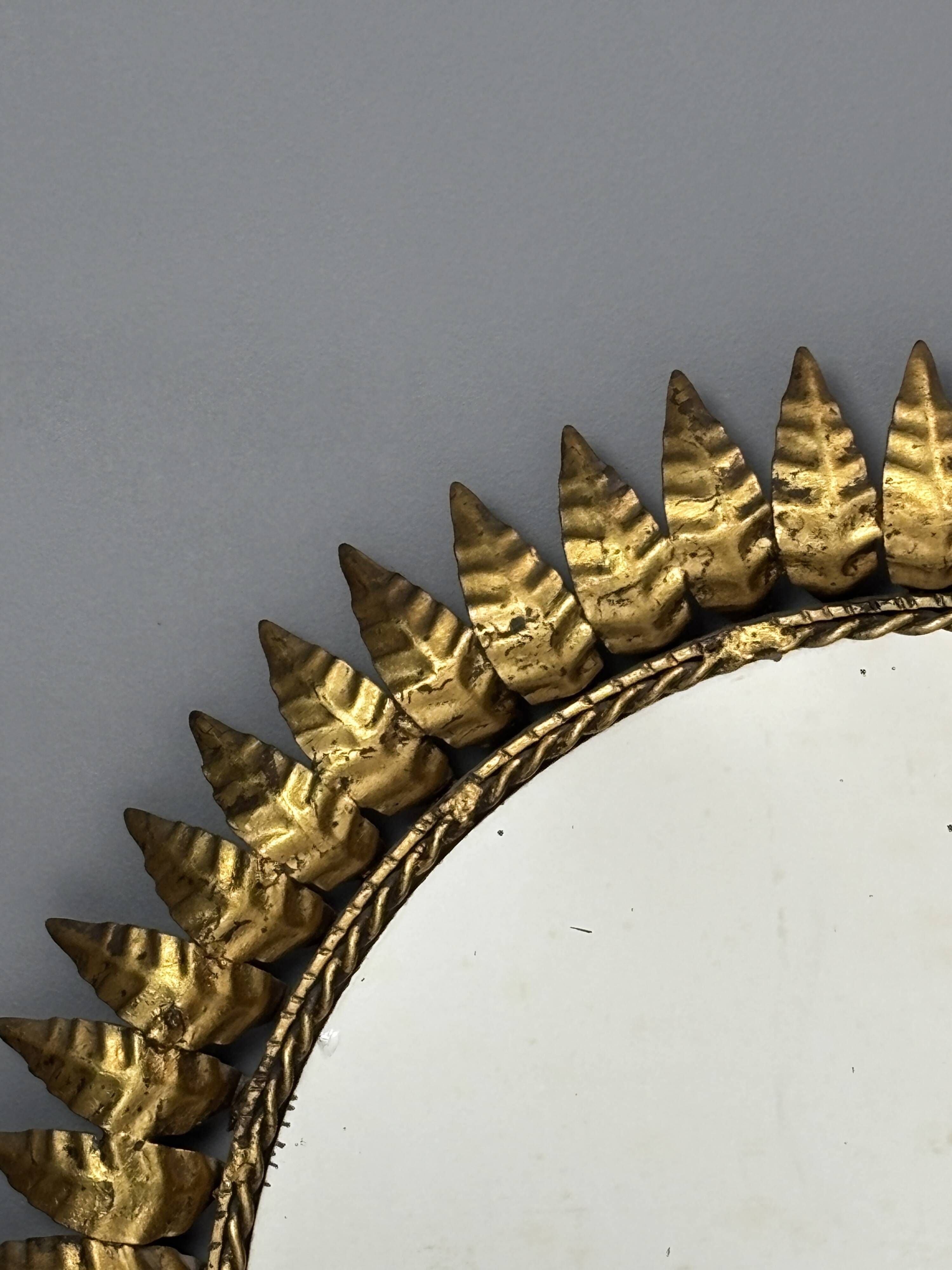 Midcentury bohemian Hollywood Regency Spanish gilt metal sun mirror, 1960s