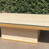 Vintage coffee table in travertine and brass.