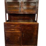 Vintage wooden display cabinet with yellow glass.